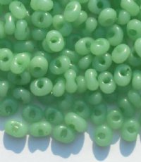 25 grams of 3x7mm Milky Green Farfalle Seed Beads